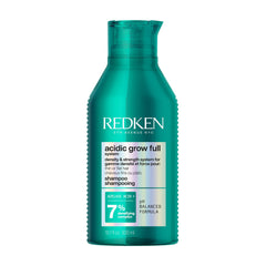 Redken bote frontal del champú mostrando etiqueta y tamaño beneficios visuales