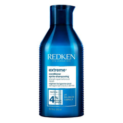 Redken envase frontal mostrando diseño y beneficio de fortalecimiento