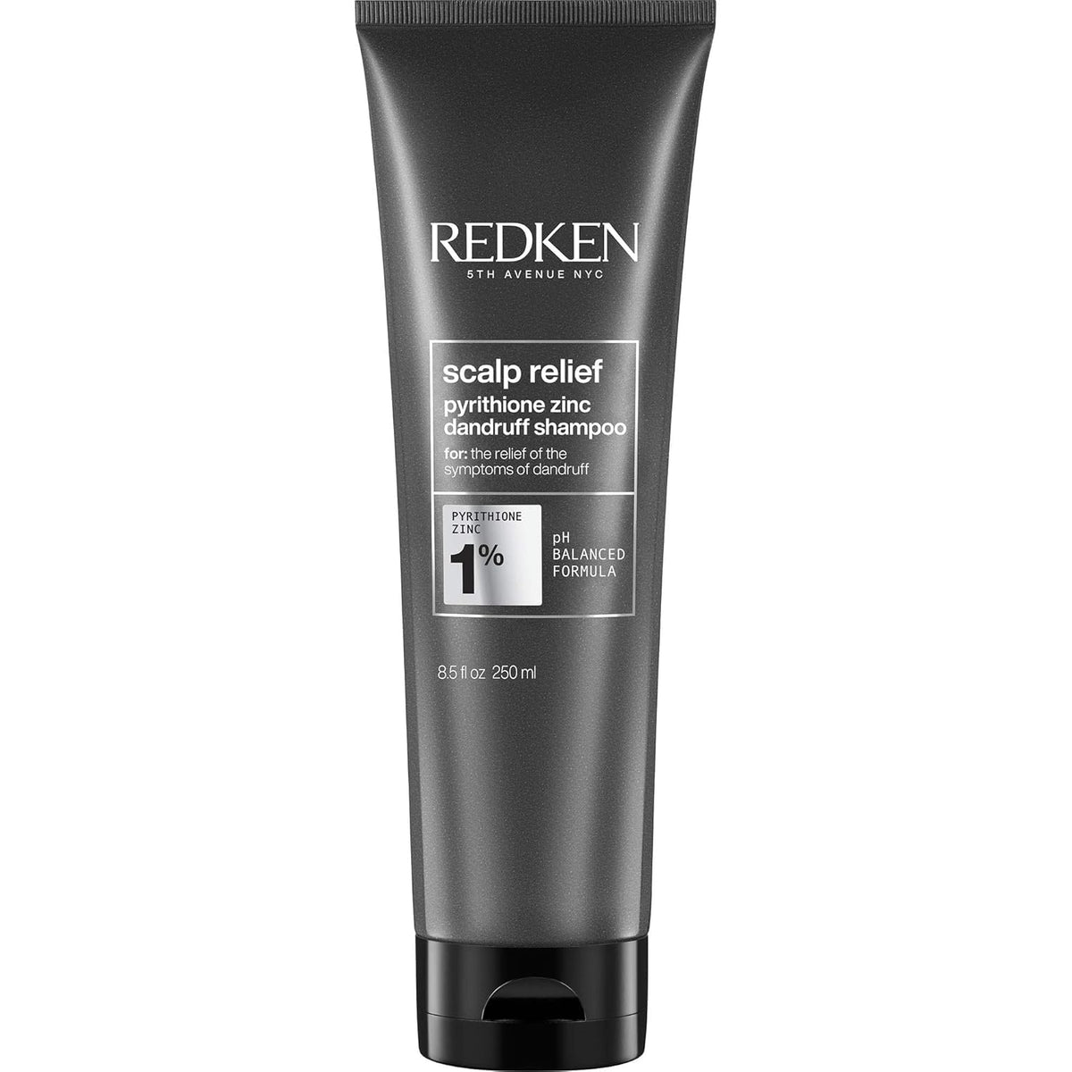 Redken envase frontal del champú anticaspa mostrando diseño profesional y limpieza
