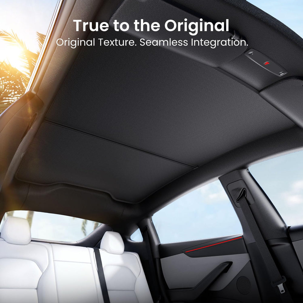 REEVAA parasol instalado en Tesla Model Y Juniper para confort térmico visible