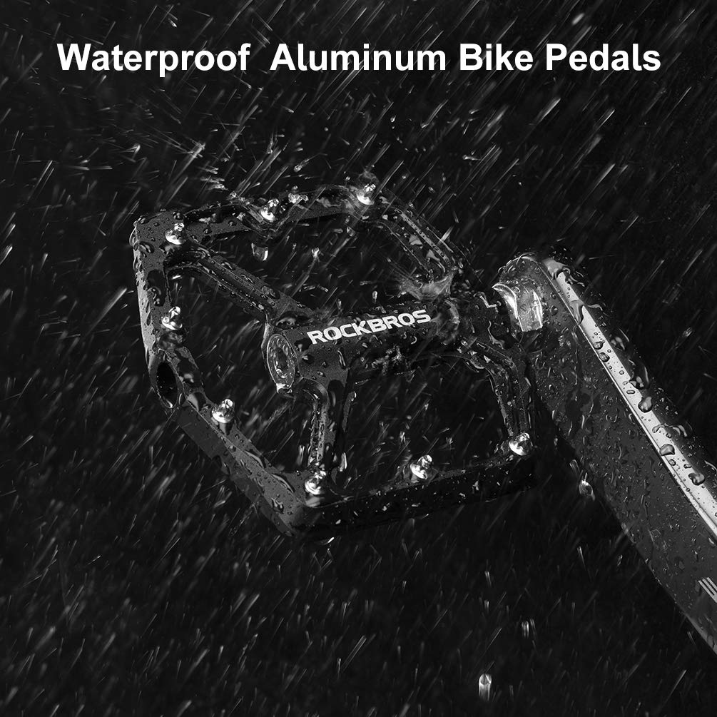 ROCKBROS flat pedals on a trail bike in use, conveys secure all-weather performance