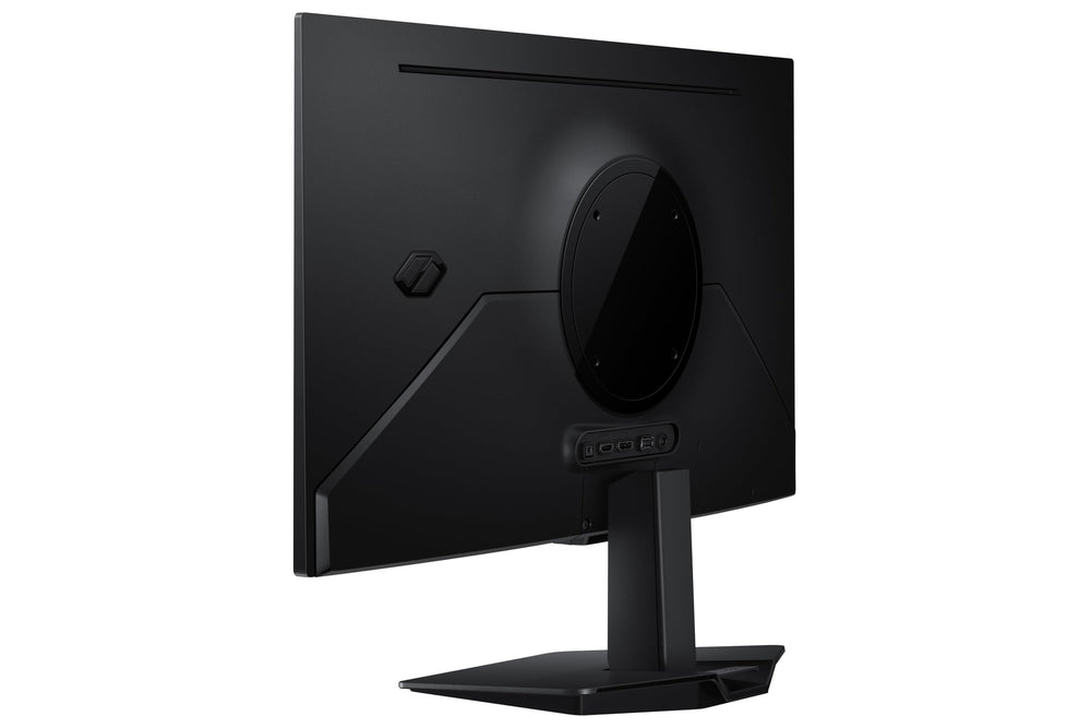 Samsung Odyssey OLED G5 mostrando escala de 27 pulgadas junto a teclado y ratón
