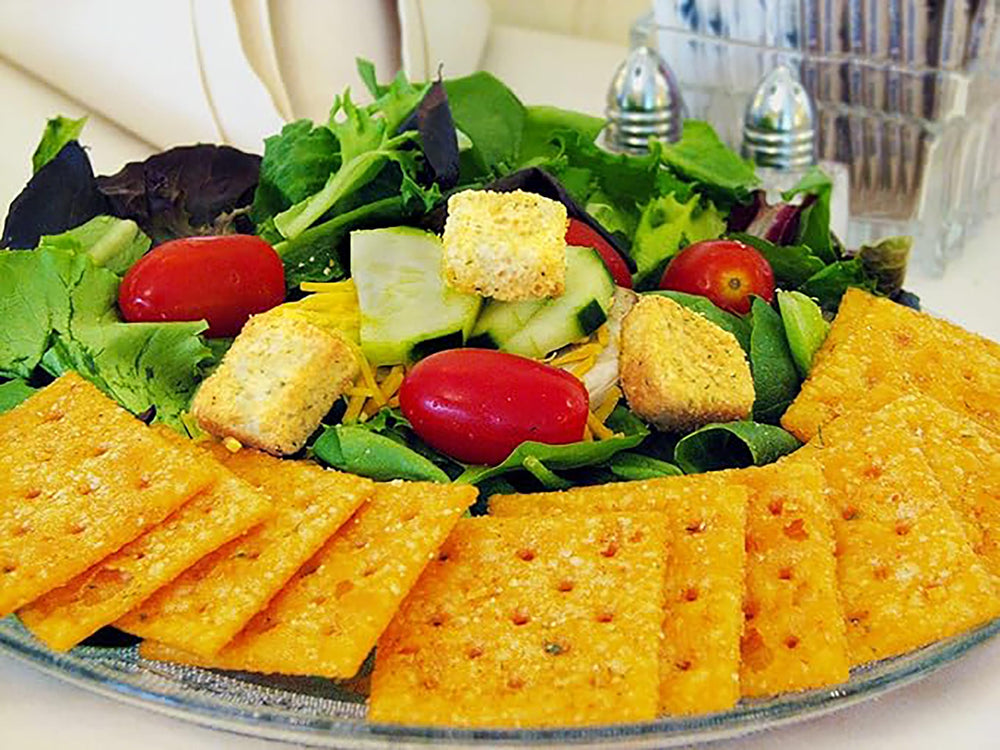 Savory Fine Foods mesa con aperitivos preparados para una reunión rápida