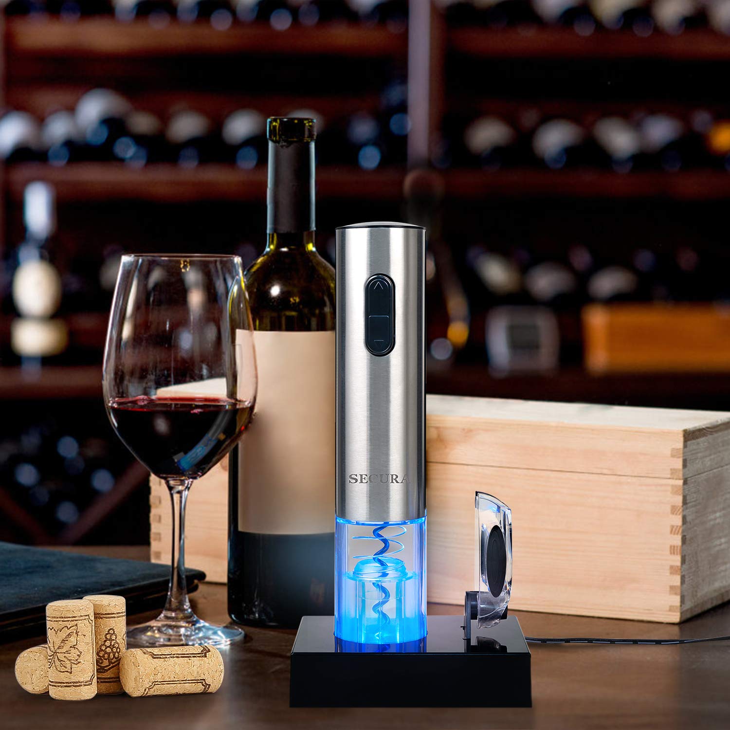 Secura opener in use removing cork from bottle to save time and reduce wrist strain