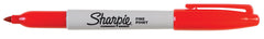 Sharpie writing on plastic label demonstrating strong surface adhesion