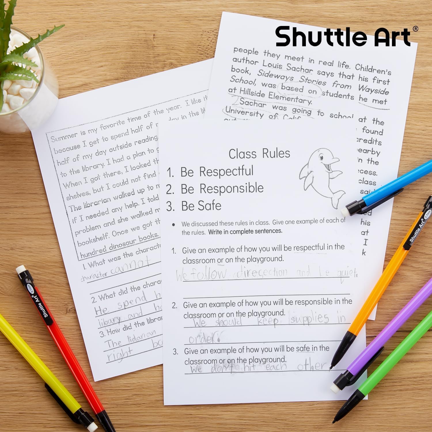 Lápiz Shuttle Art en mano para comparar tamaño y ergonomía cómoda