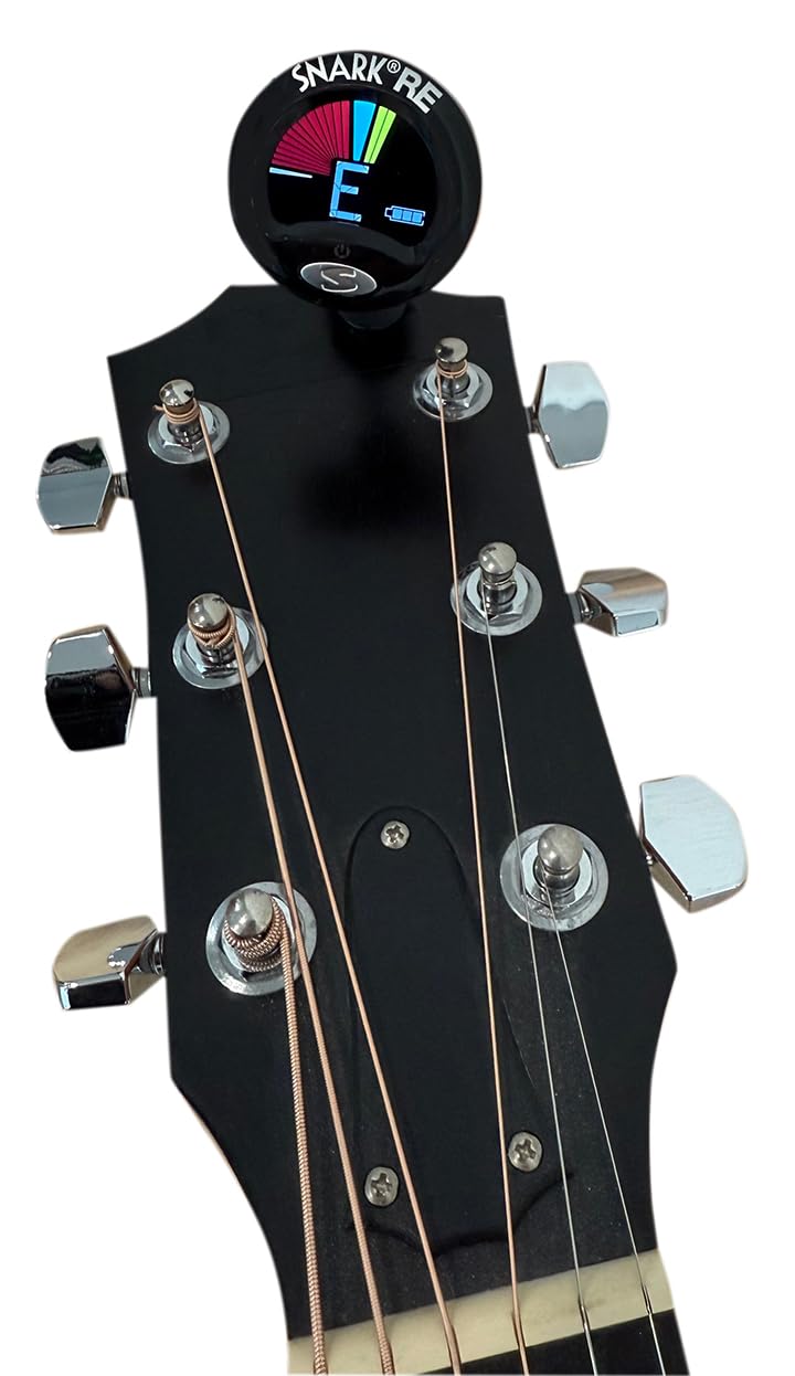 SNARK SN5X mounted on guitar headstock showing vibration sensing and on-stage convenience
