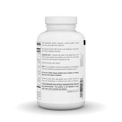 Source Naturals espolvoreado sobre ensalada demuestra uso sugerido al comer