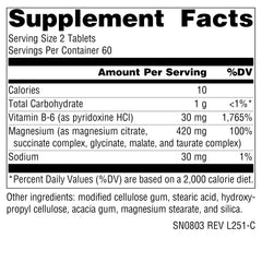 Source Naturals tabletas en mano mostrando tamaño práctico y portabilidad