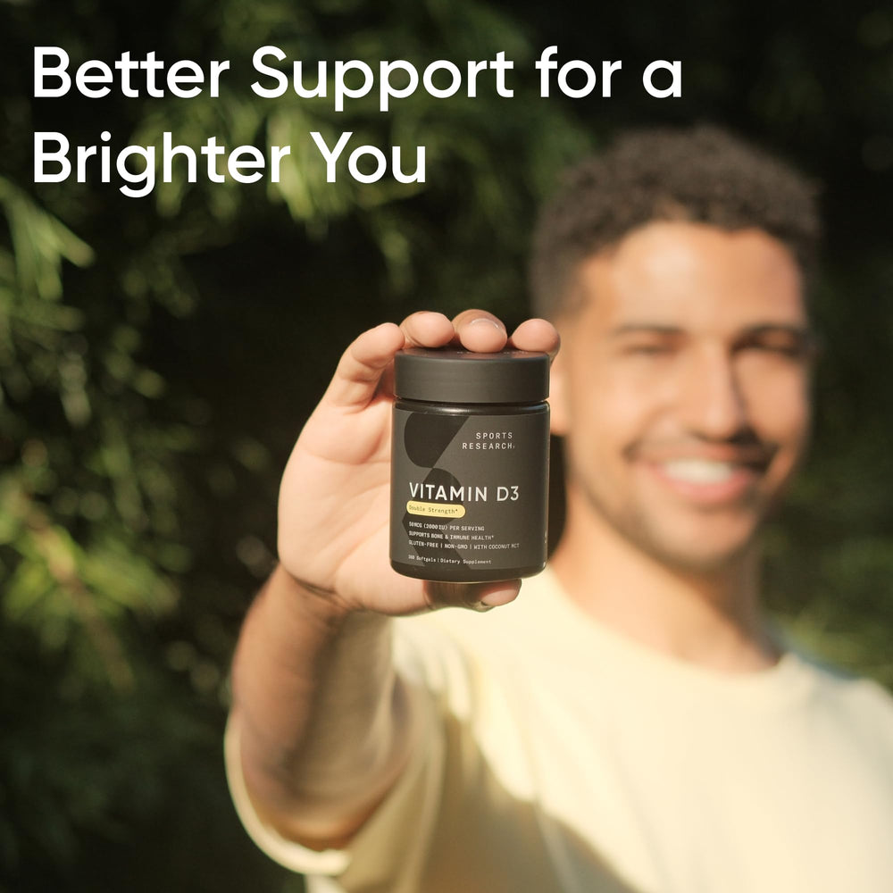 Sports Research botella abierta con softgels mostrando contenido y color