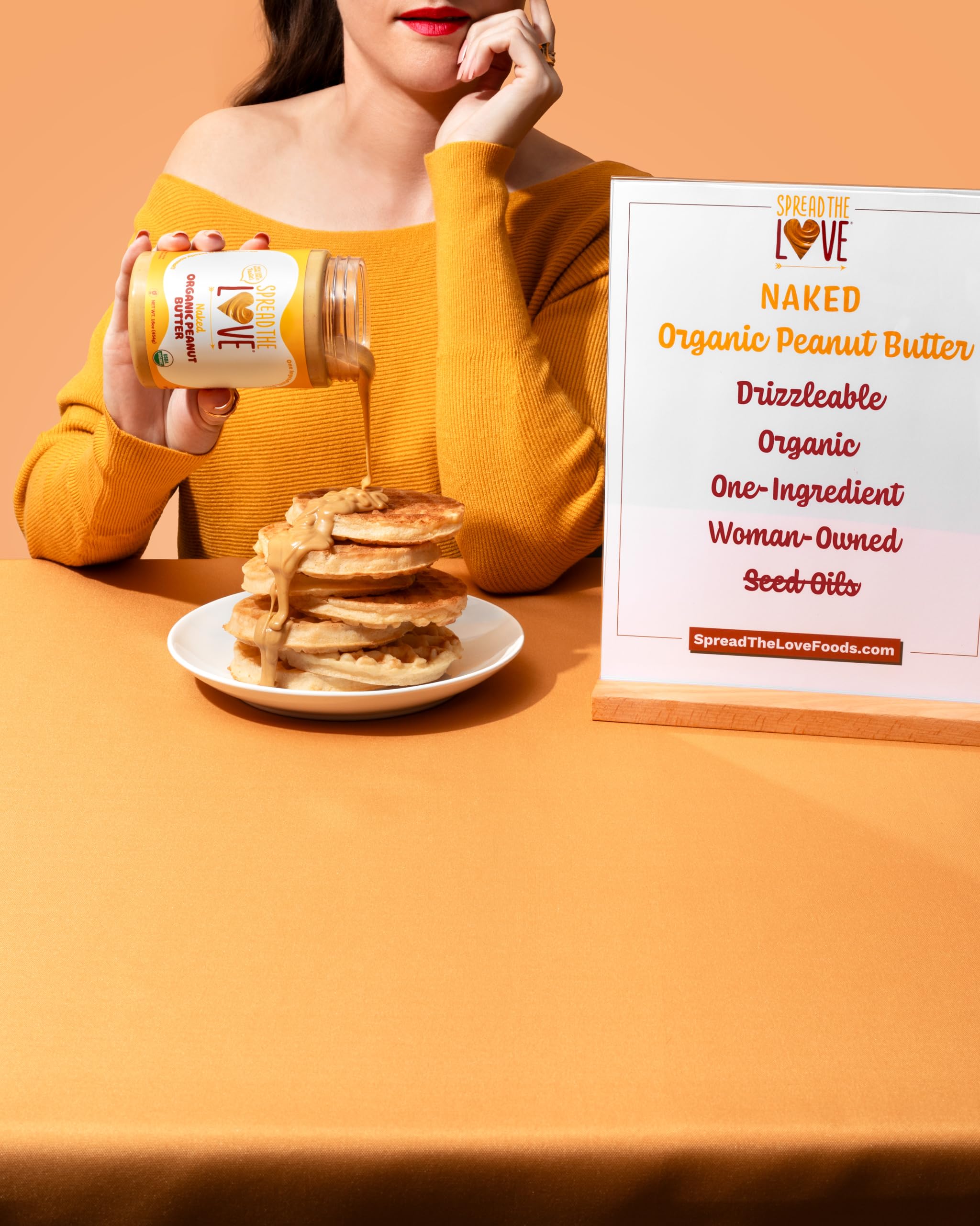 Spread The Love tarro en mesa de desayuno con fruta, opción saludable para familias