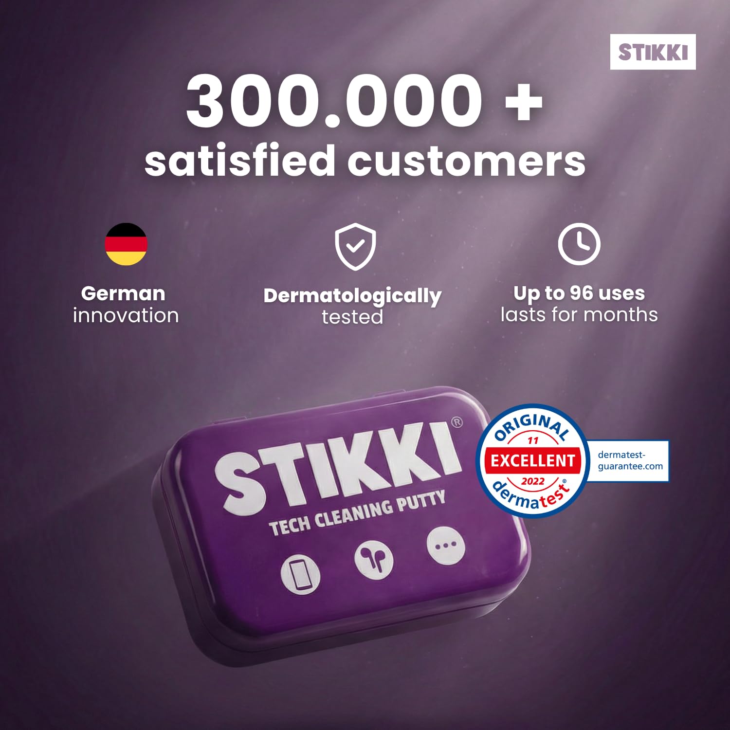 STIKKI kit de limpieza sobre mesa con teléfono y laptop, mantenimiento doméstico