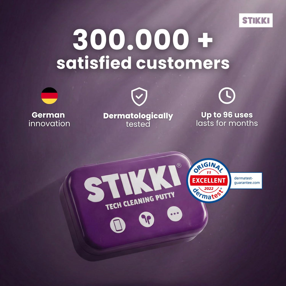 STIKKI kit de limpieza sobre mesa con teléfono y laptop, mantenimiento doméstico