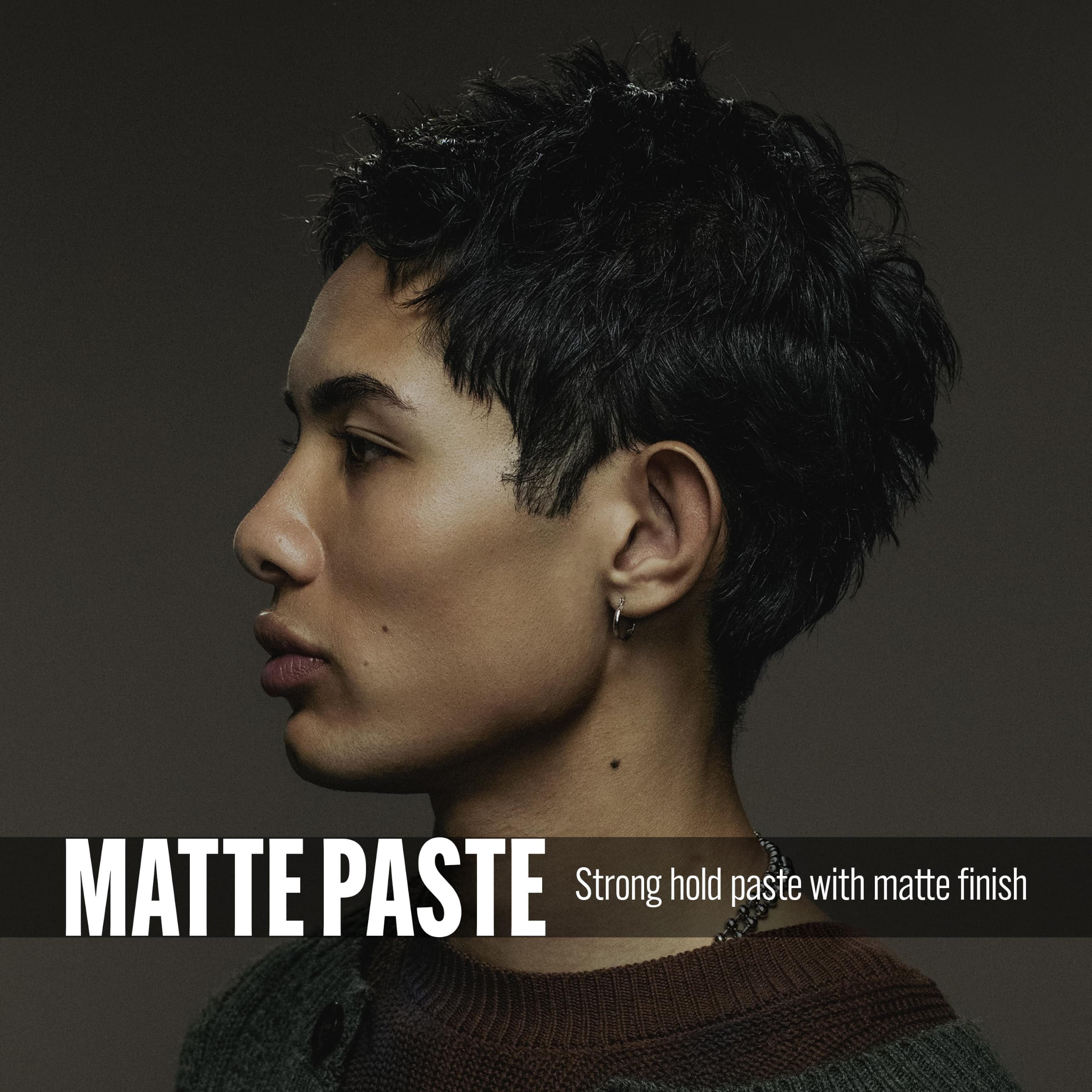 STMNT matte paste in-hand being scooped for fast application and control