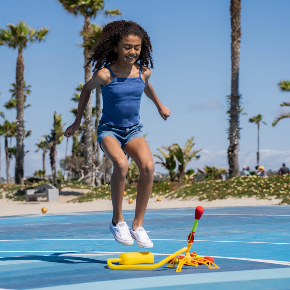 Stomp Rocket cohete apoyado junto a distintas bases compatibles