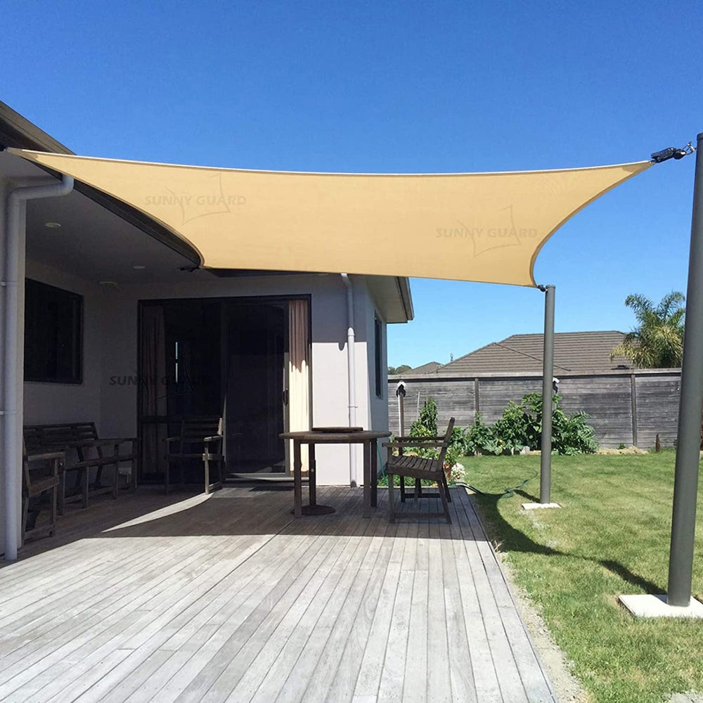SUNNY GUARD front view of 10x13 sand shade sail showing clean rectangular profile and UV protection