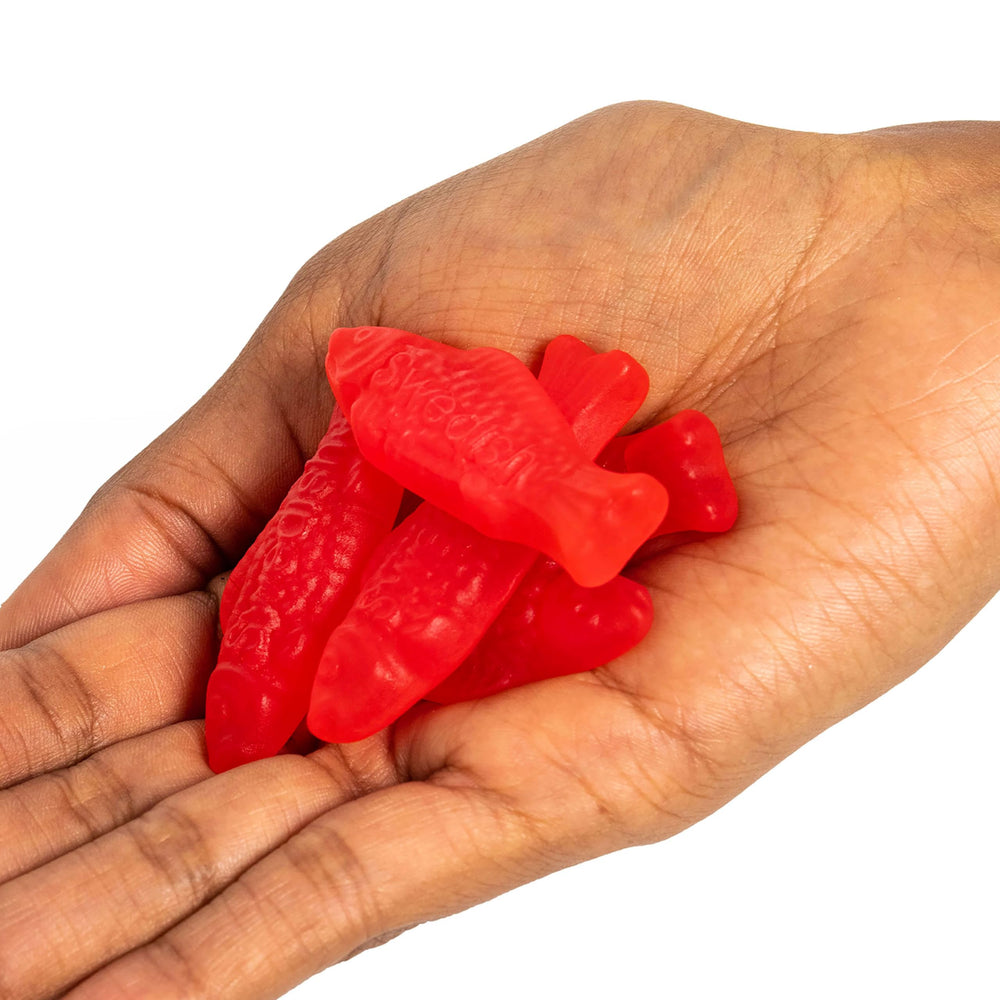 Swedish Fish presentación junto a palomitas en sala para snack de cine en casa