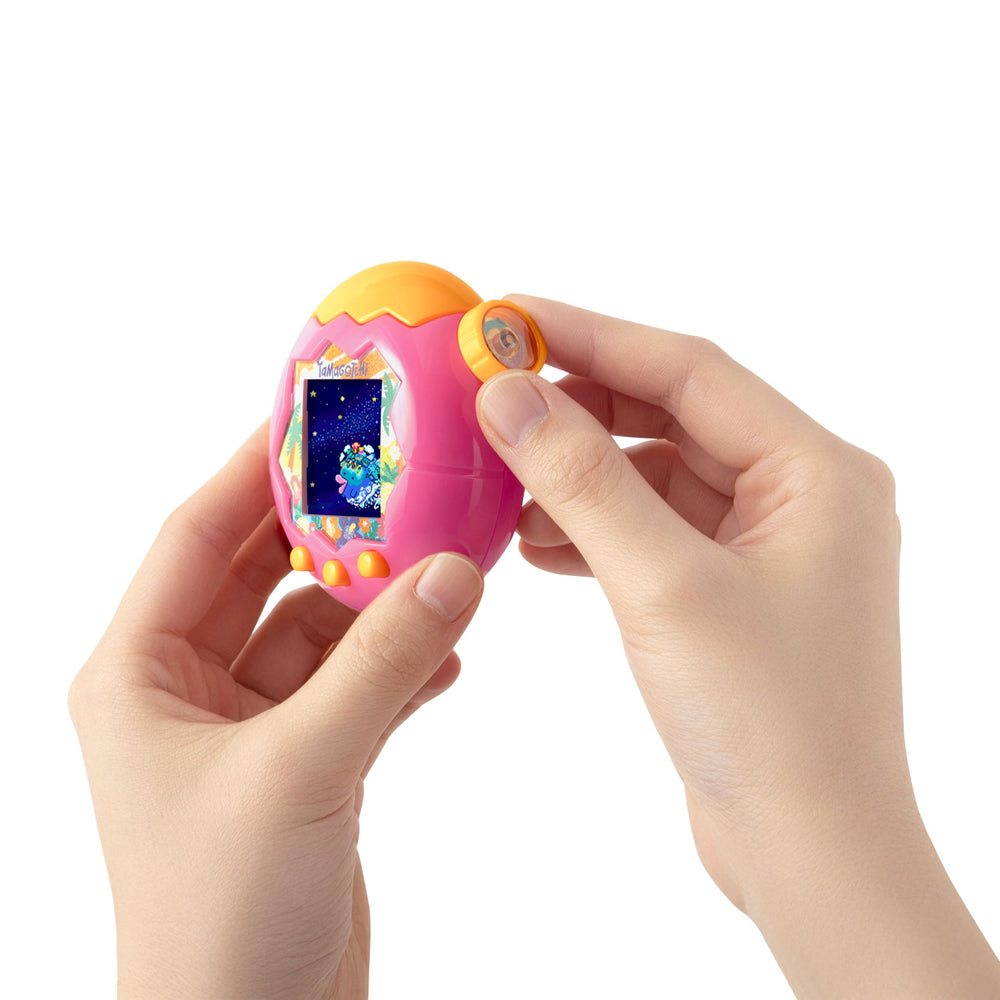Pantalla mostrando Tama en el campo, Tamagotchi interacción clásica y cuidados
