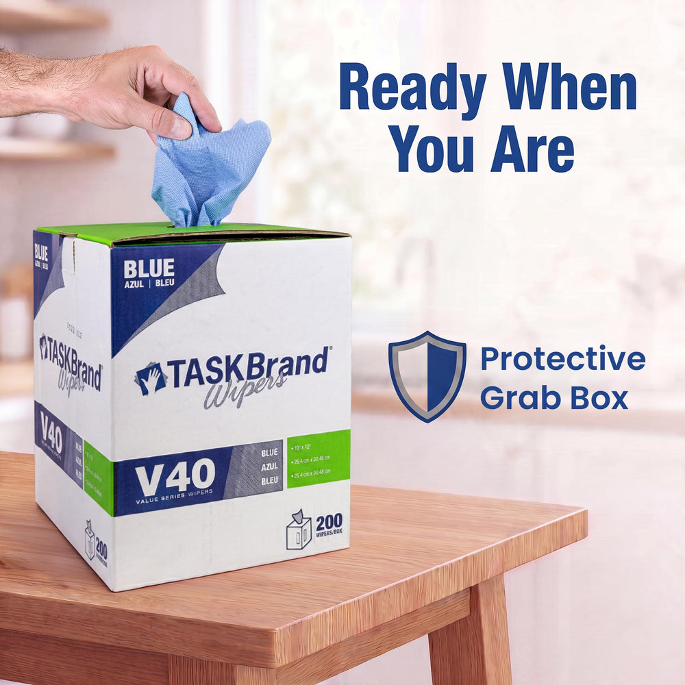 TaskBrand paños en uso dentro de taller mecánico, solución profesional