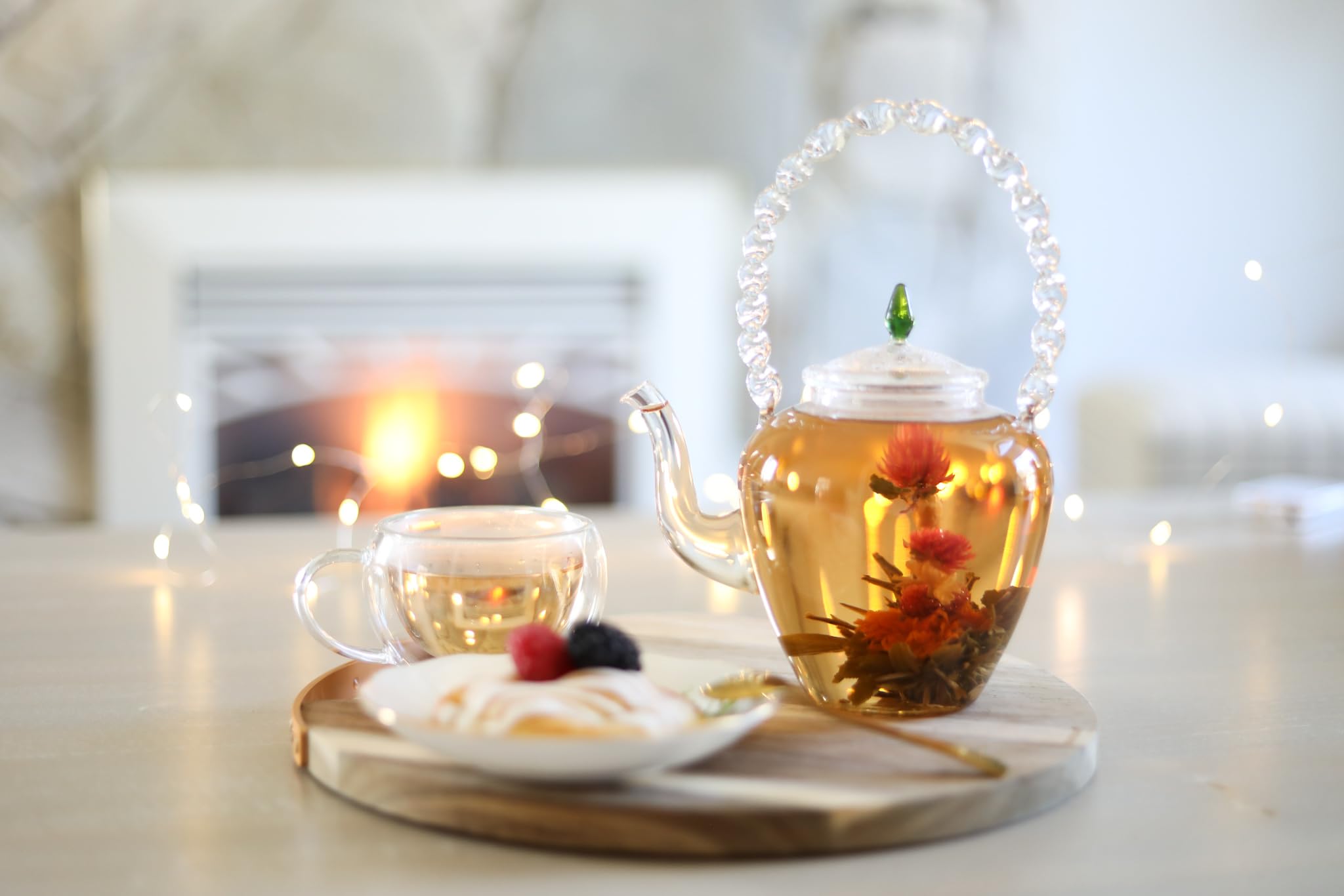 Teabloom taza con flor desplegada ofreciendo aroma y sabor