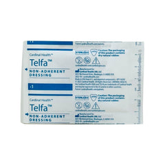Telfa Pads aplicación en mano ilustra retiro suave sin adherencia