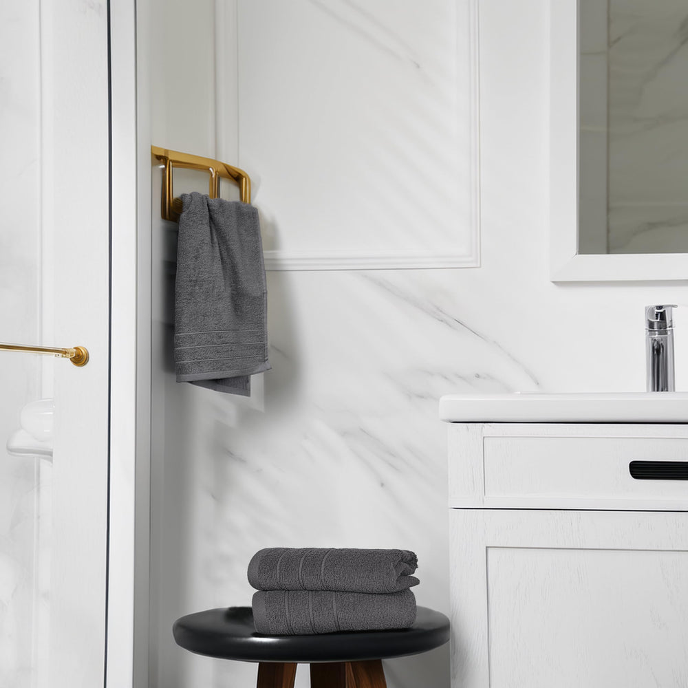 Tens Towels comparación de tamaño con manos, muestra proporción útil