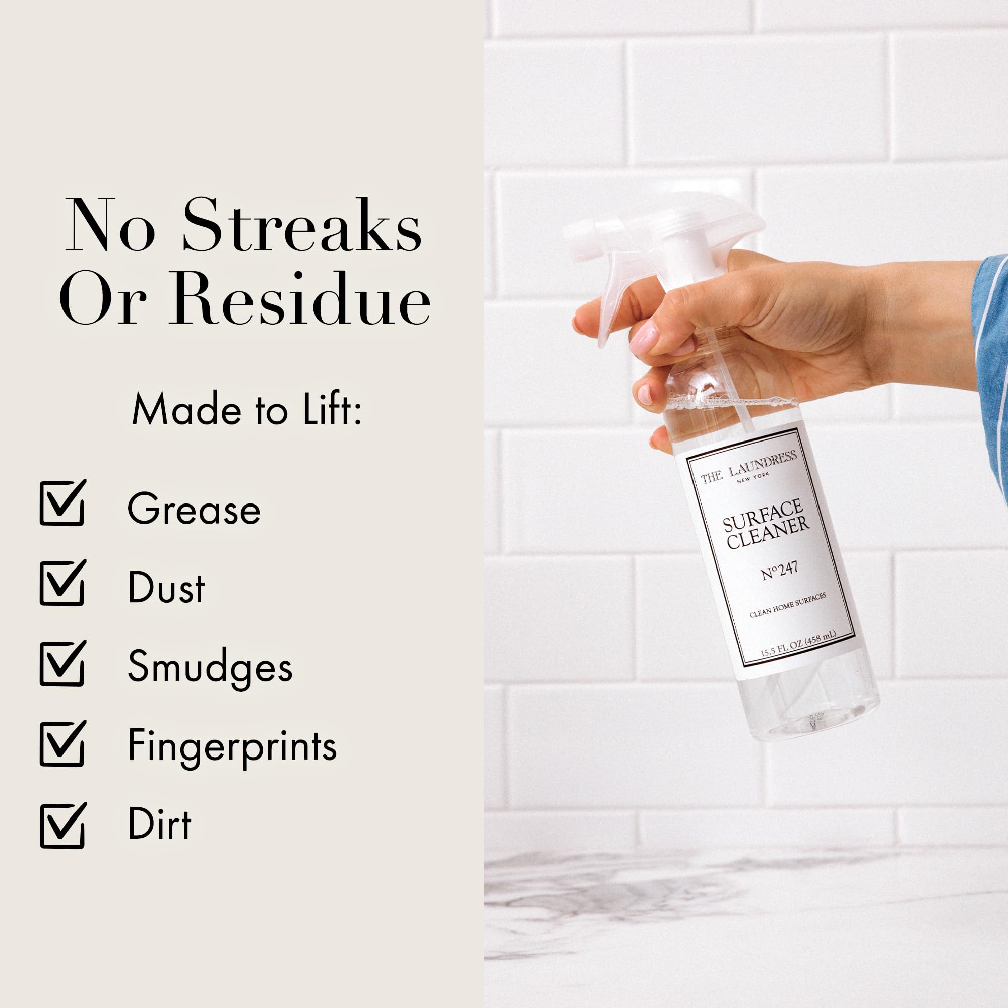 The Laundress Surface Cleaner comparado con una mano para mostrar tamaño 458 ml