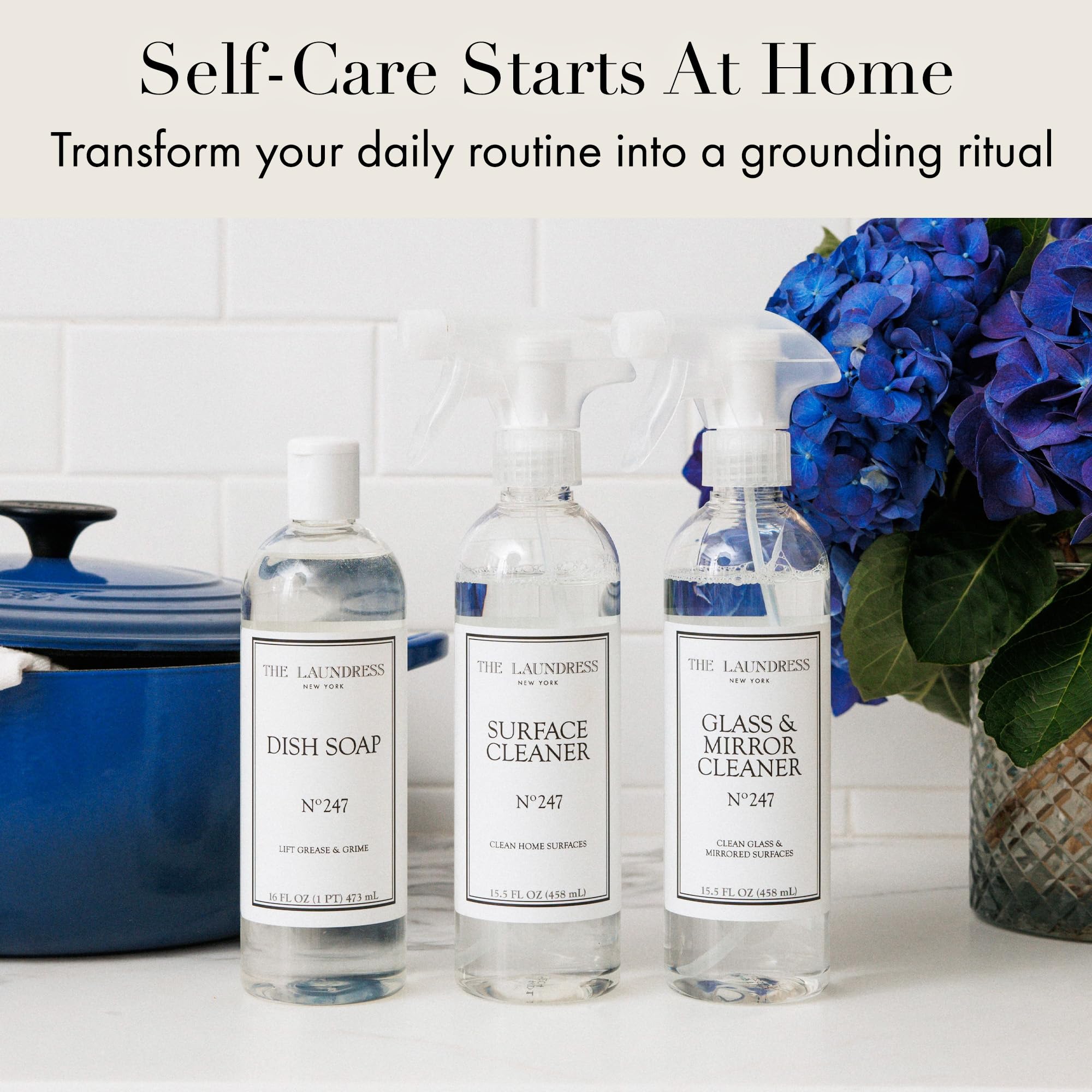 The Laundress Surface Cleaner en cocina estilizada limpiando acero inoxidable y porcelana