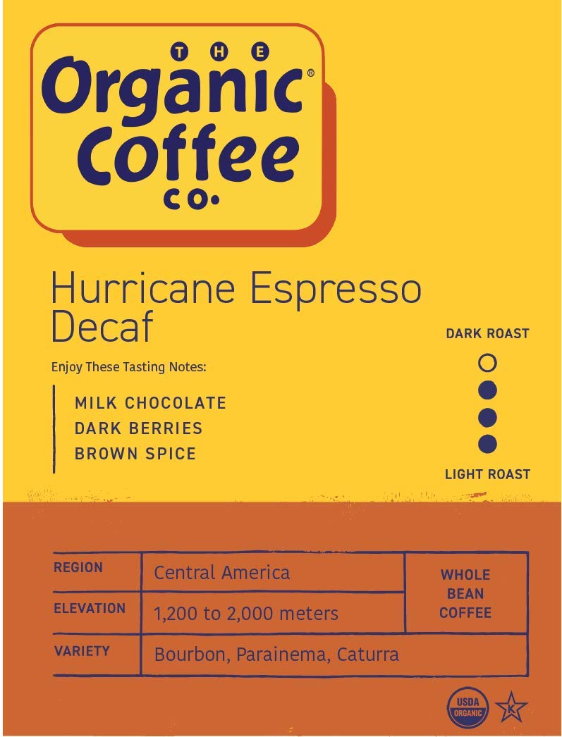 Granos enteros Hurricane Espresso Decaf en primer plano destacando tueste oscuro y textura