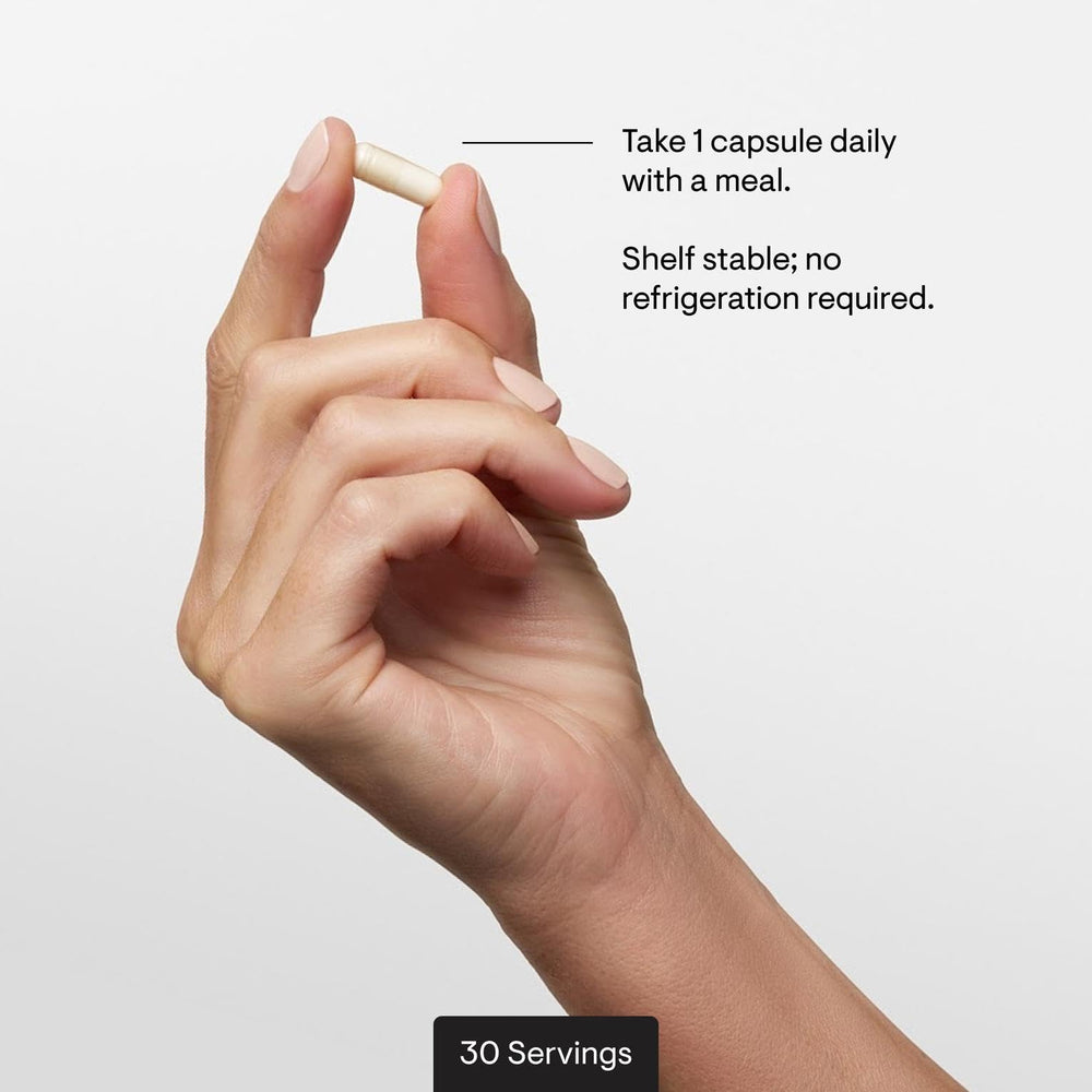THORNE cápsula junto a una moneda para comparar tamaño y dosificación visual