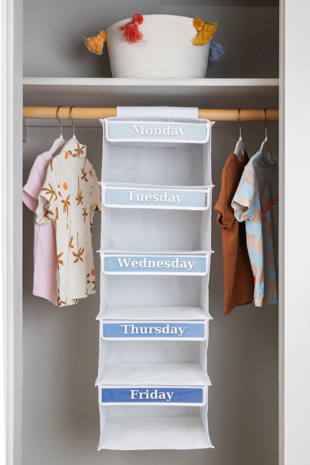 Three Sweet Peas Co organizer in a bedroom lifestyle shot showing tidy weekly wardrobe planning