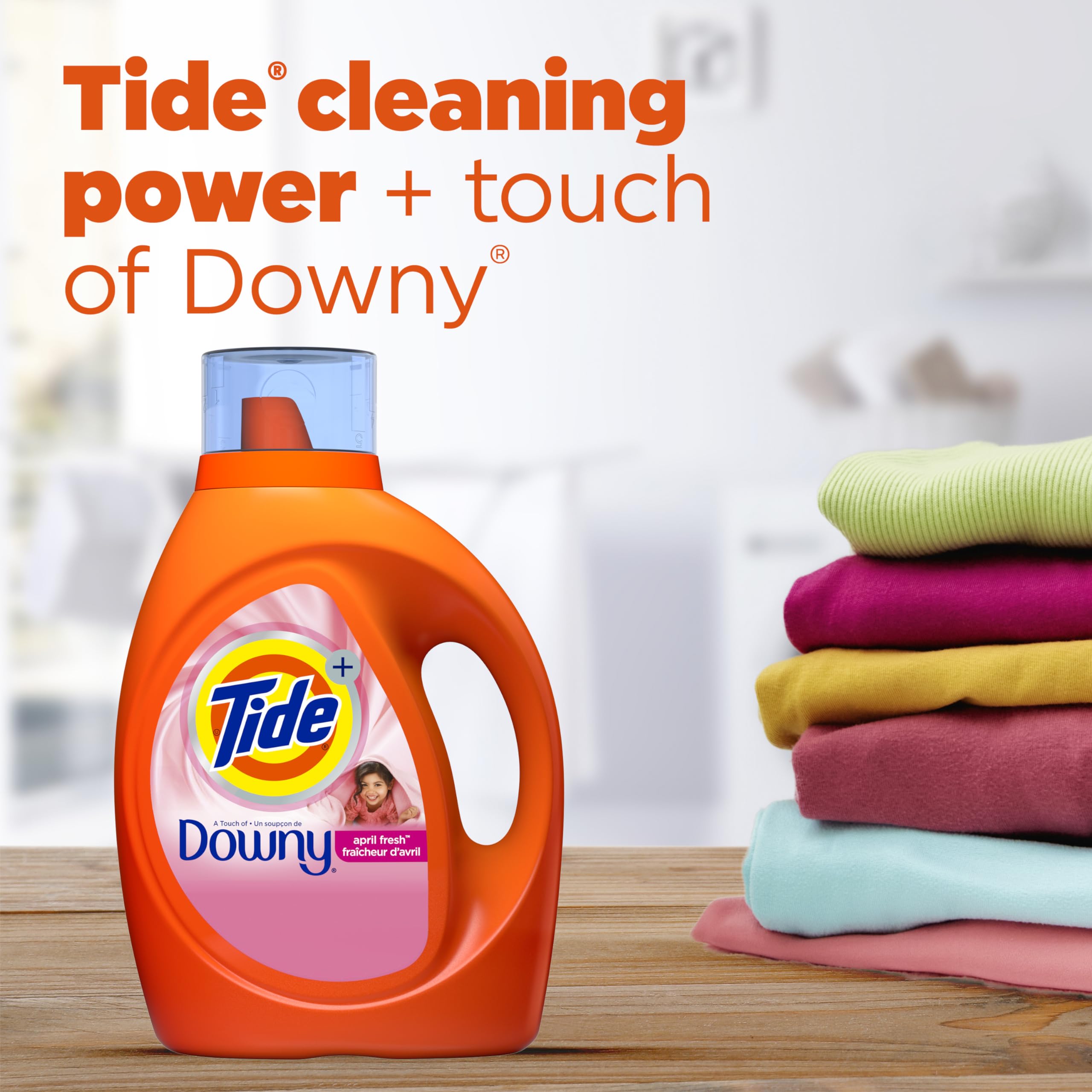 Botella de Tide con Downy con vaso medidor para dosificación precisa
