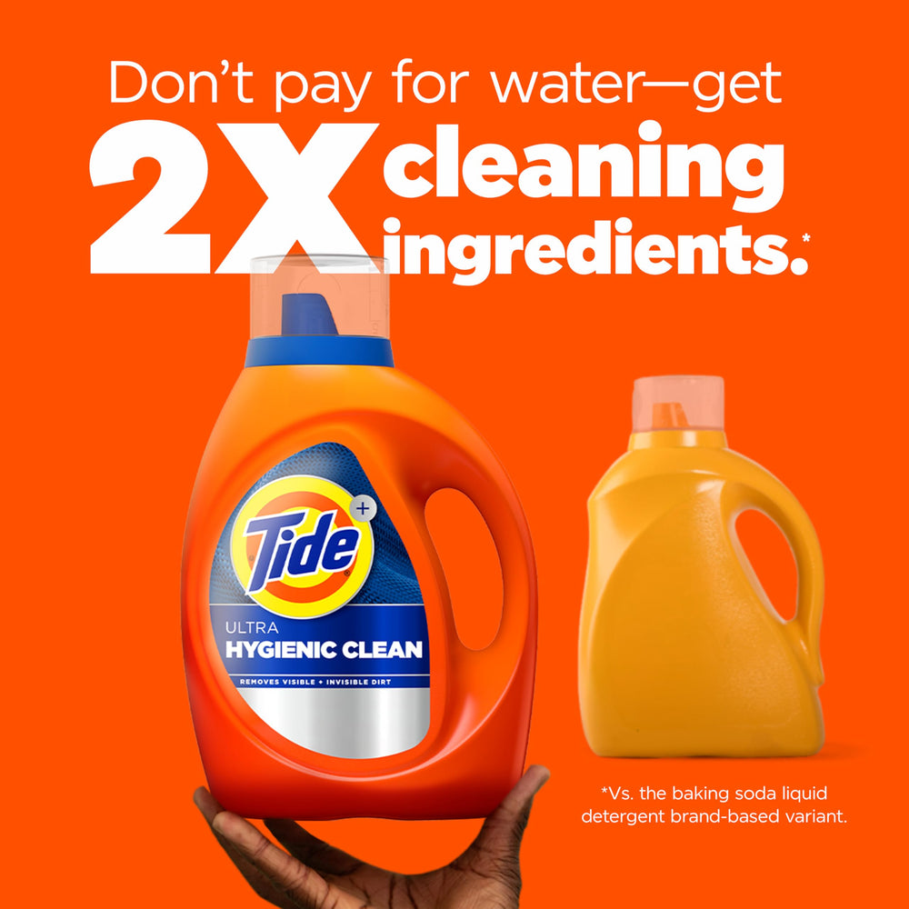 Tide close-up del líquido concentrado para penetrar fibras y remover residuos