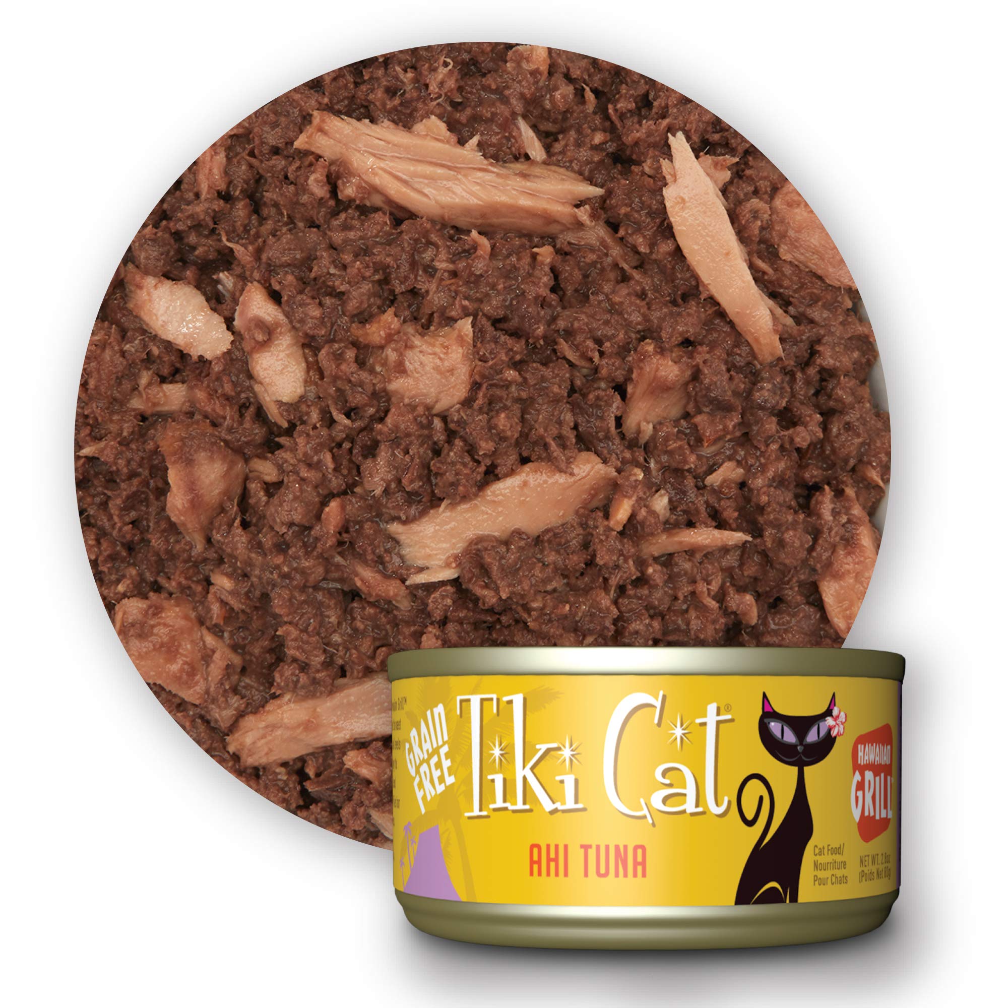 TIKI PETS cat eating from a bowl enjoying the Grill recipe, demonstrating high palatability