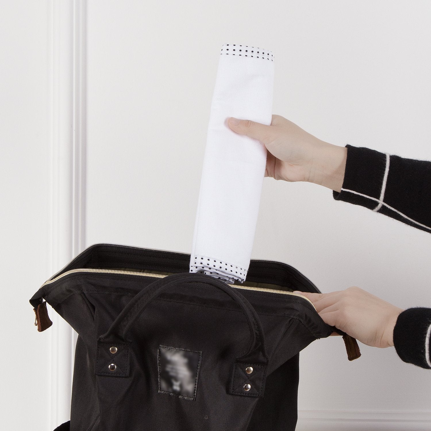 TILLYOU reverso impermeable mostrando barrera contra filtraciones
