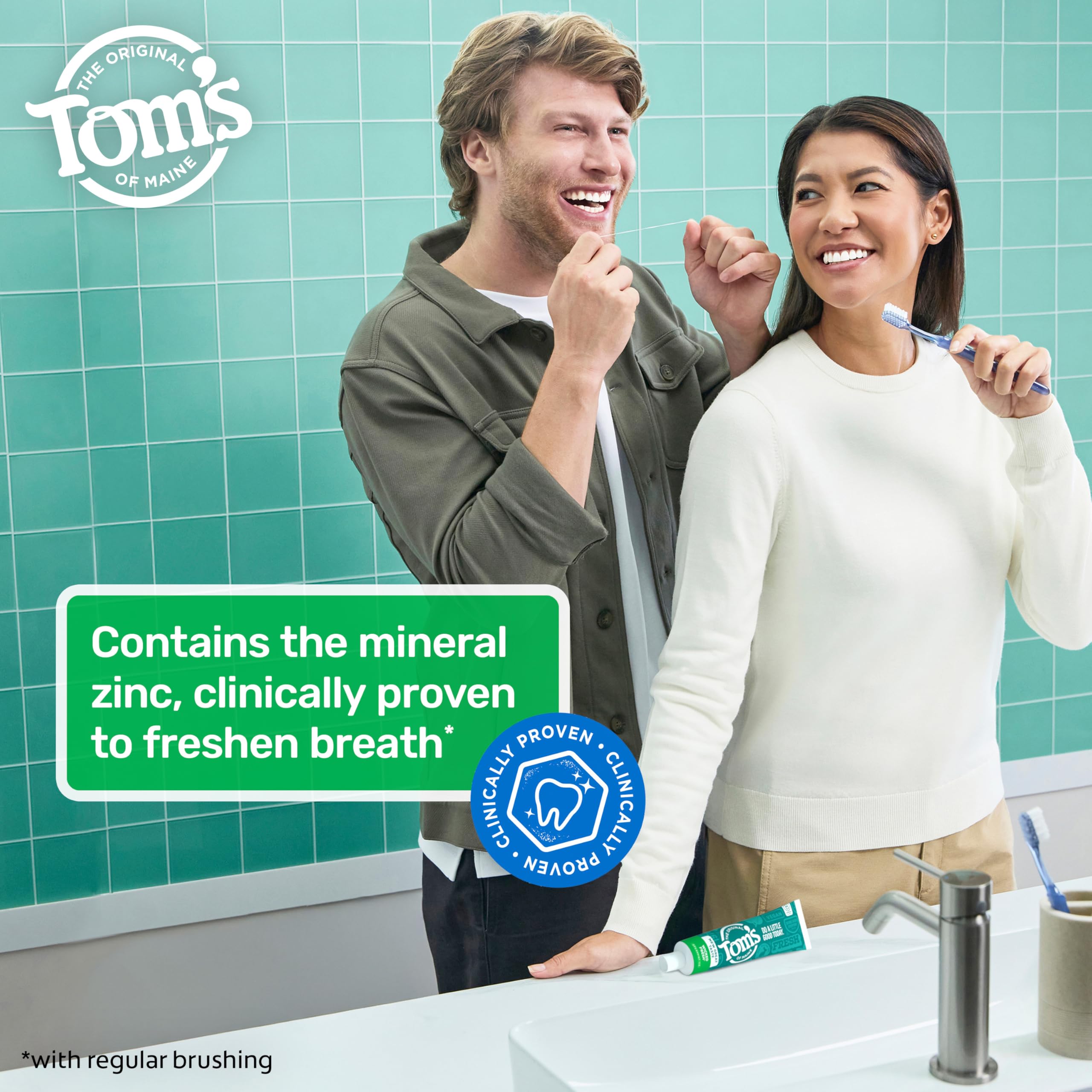 Tom's of Maine tubo junto a regla para comparar tamaño práctico