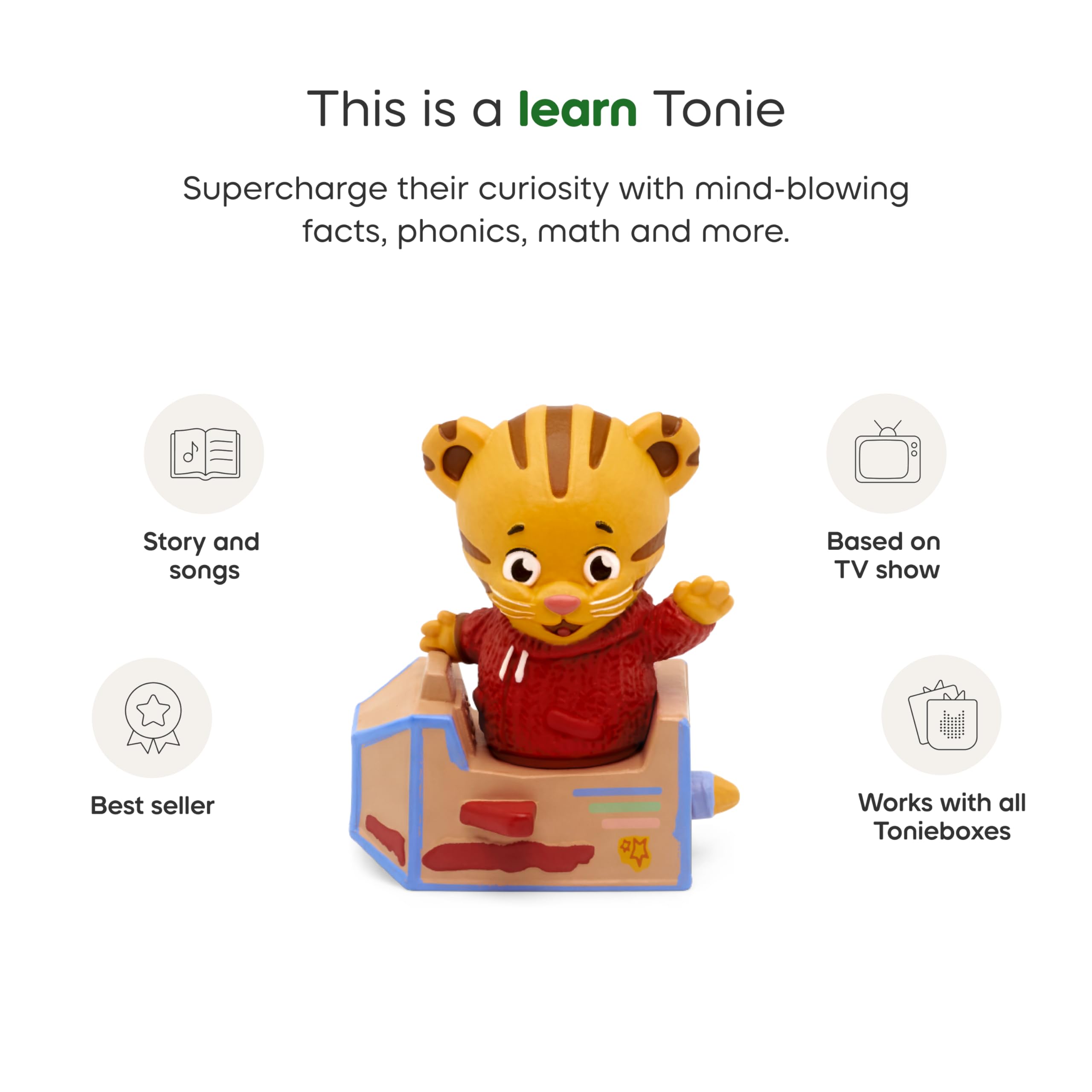 Tonies Daniel the Tiger junto a una mano para mostrar tamaño y facilidad de agarre