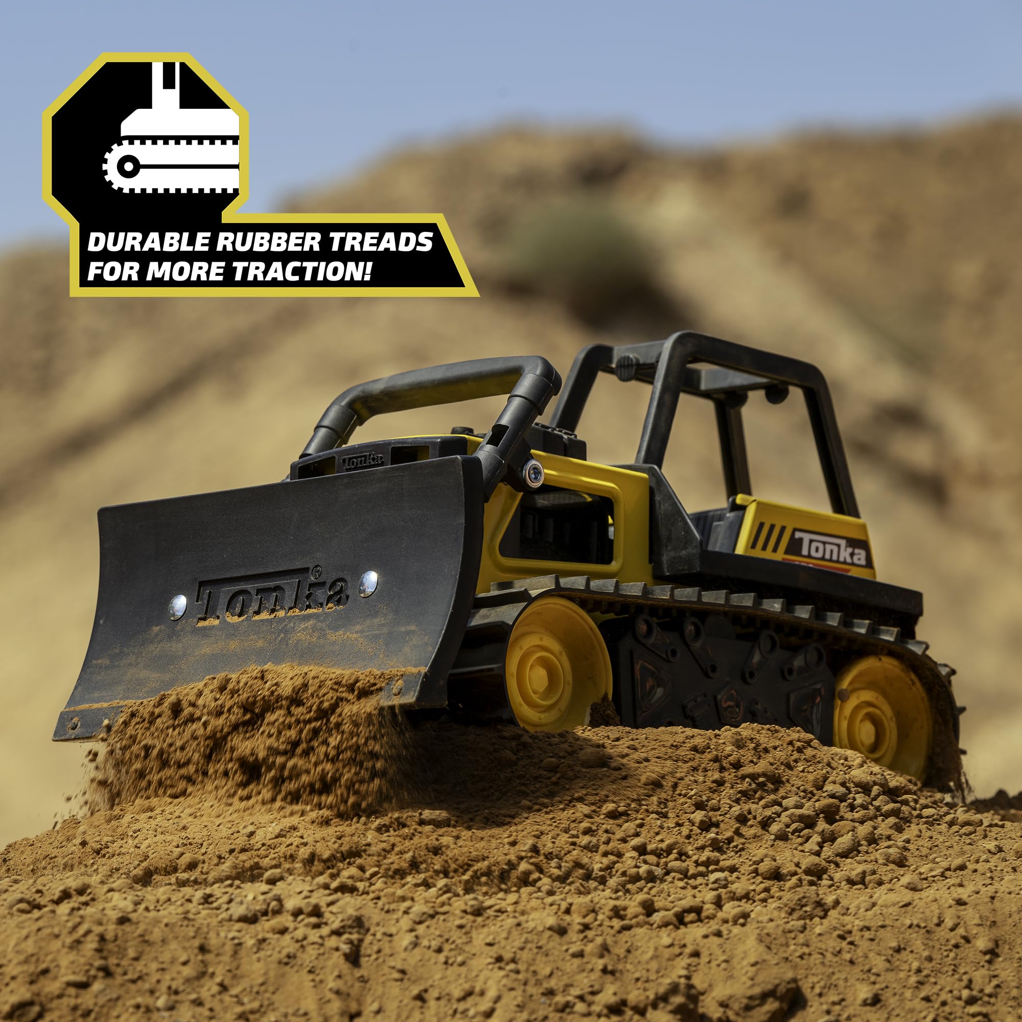 Tonka in sandbox use demonstrating hands-on digging fun and tactile learning benefit