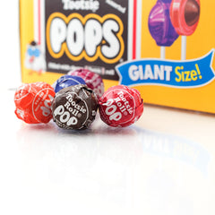 Tootsie Pops surtido desplegado en mesa con colores llamativos Tootsie