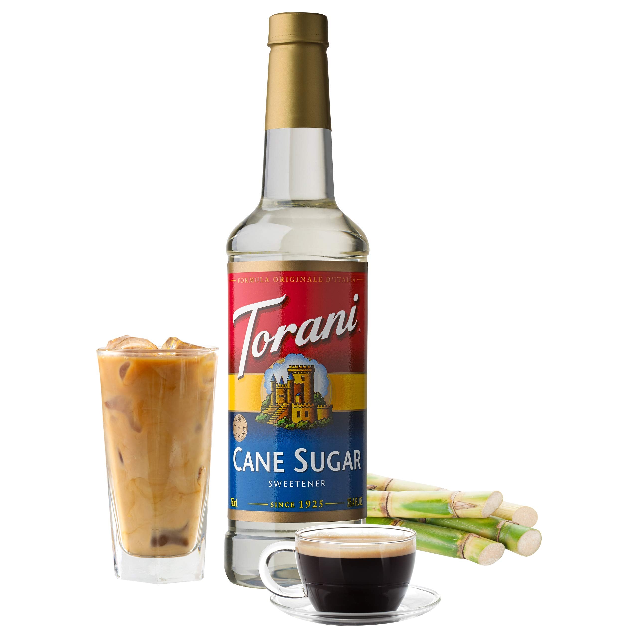 Torani botella 25.4 fl oz en mano de barista para fácil dosificado