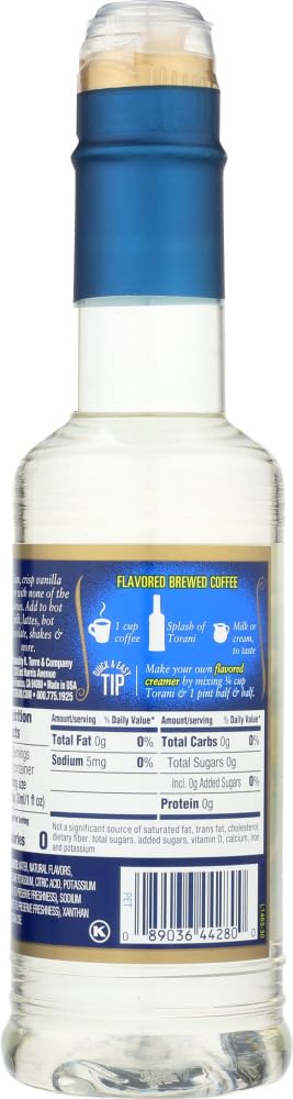 Taza de latte aromático con Torani vainilla en uso y beneficio de aroma realzado
