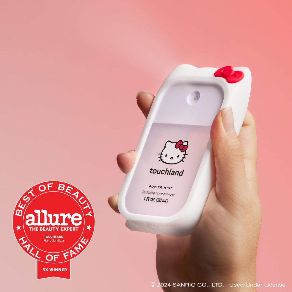 Frutos rojos y pétalos que ilustran la fragancia Berry Bliss de Touchland