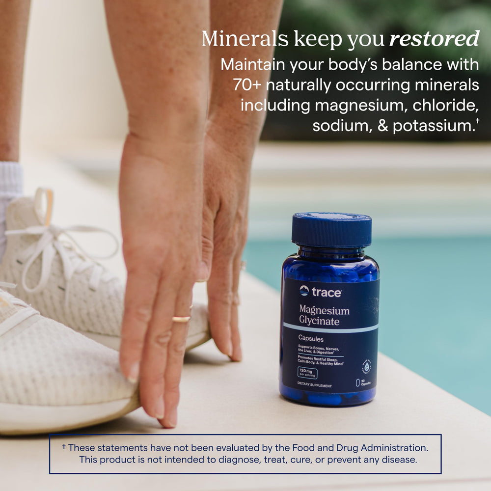 Trace Minerals cápsulas abiertas mostrando polvo de magnesio glicinato