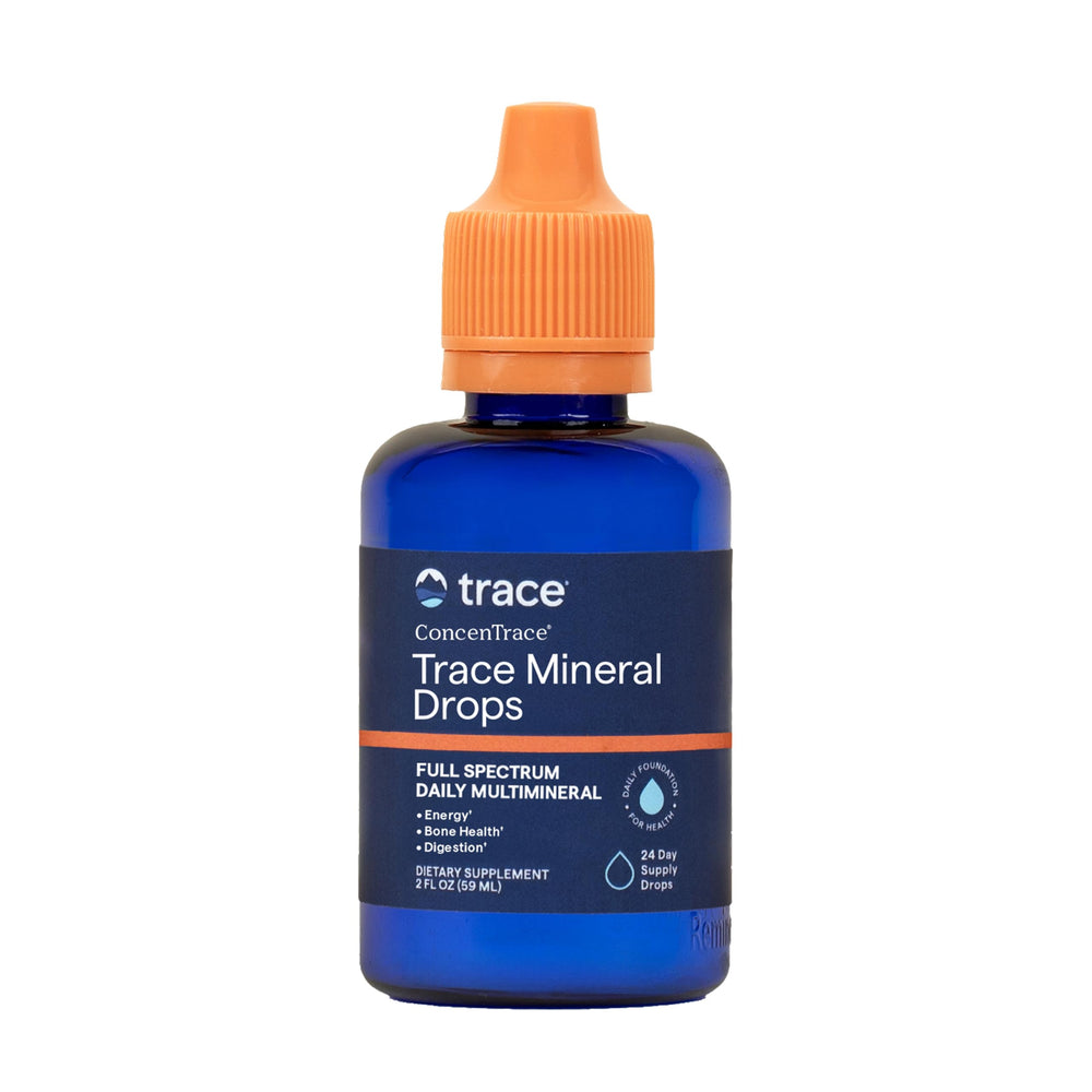 Trace Minerals frasco frontal del producto muestra la presentación de 2 fl oz y fácil dosificación