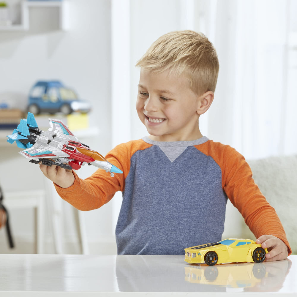 Transformers Starscream cambio a jet en manos, marca Transformers para transformaciones fáciles