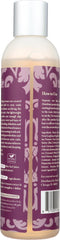 Treluxe textura del sérum en gotas sobre la mano, beneficio: fórmula ligera y no grasa