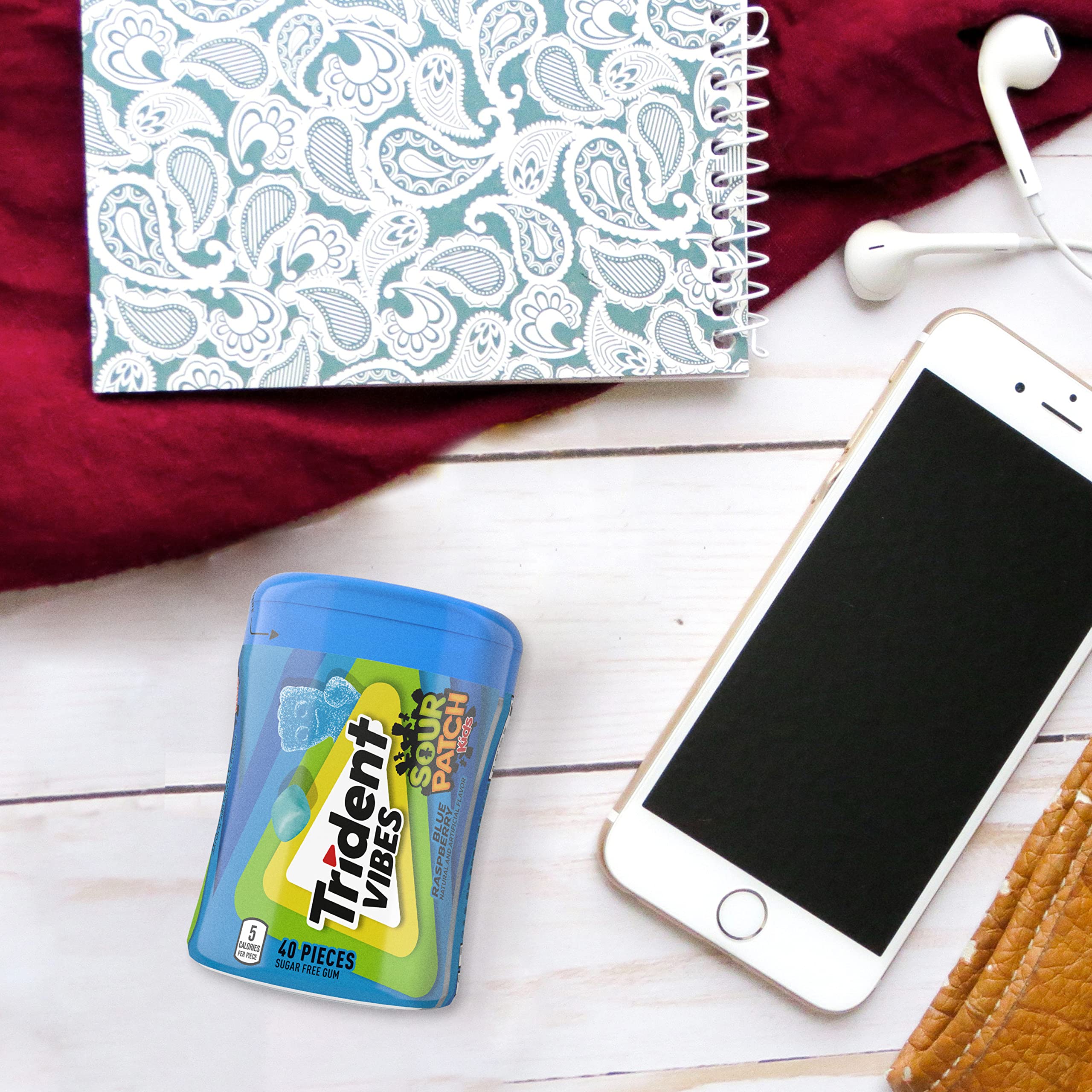 Trident bottle on office desk with pieces shared for coworkers and quick refresh