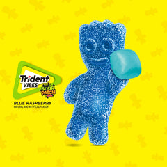 Open Trident bottle filled with blue raspberry gum pieces ready to grab and chew