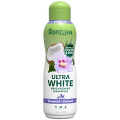 TropiClean botella frontal 20 oz mostrando la presentación y beneficio blanqueador