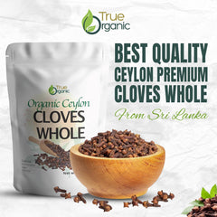 True Organic clavos en cuchara sobre cocina ilustrando uso culinario